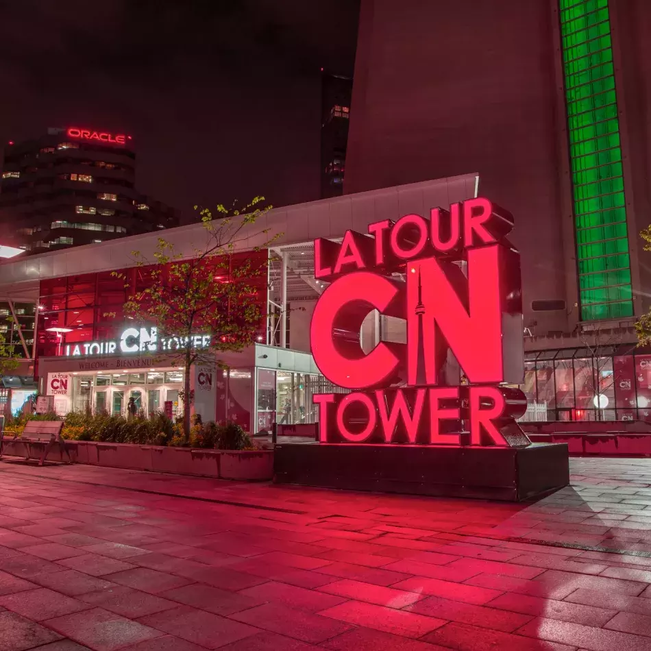 The CN Tower sign outside, at the base of the tower