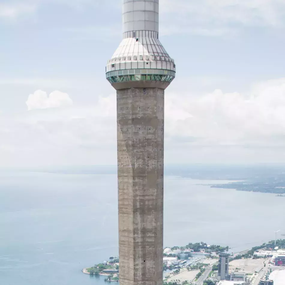 Skypod section of the tower taken at eye level. Toronto below and clouds in the backround.